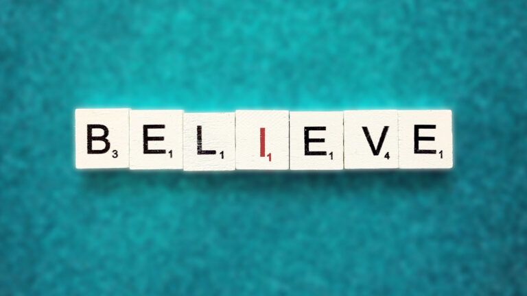 Letter tiles say "believe"