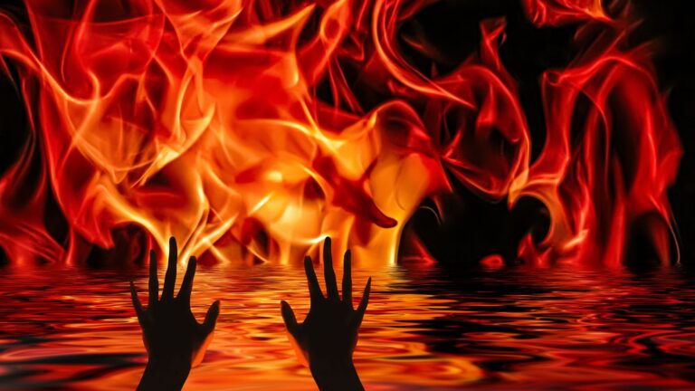 Silhouetted hands reach up from dark water toward flames, illustrating spiritual danger and the seriousness of evil.