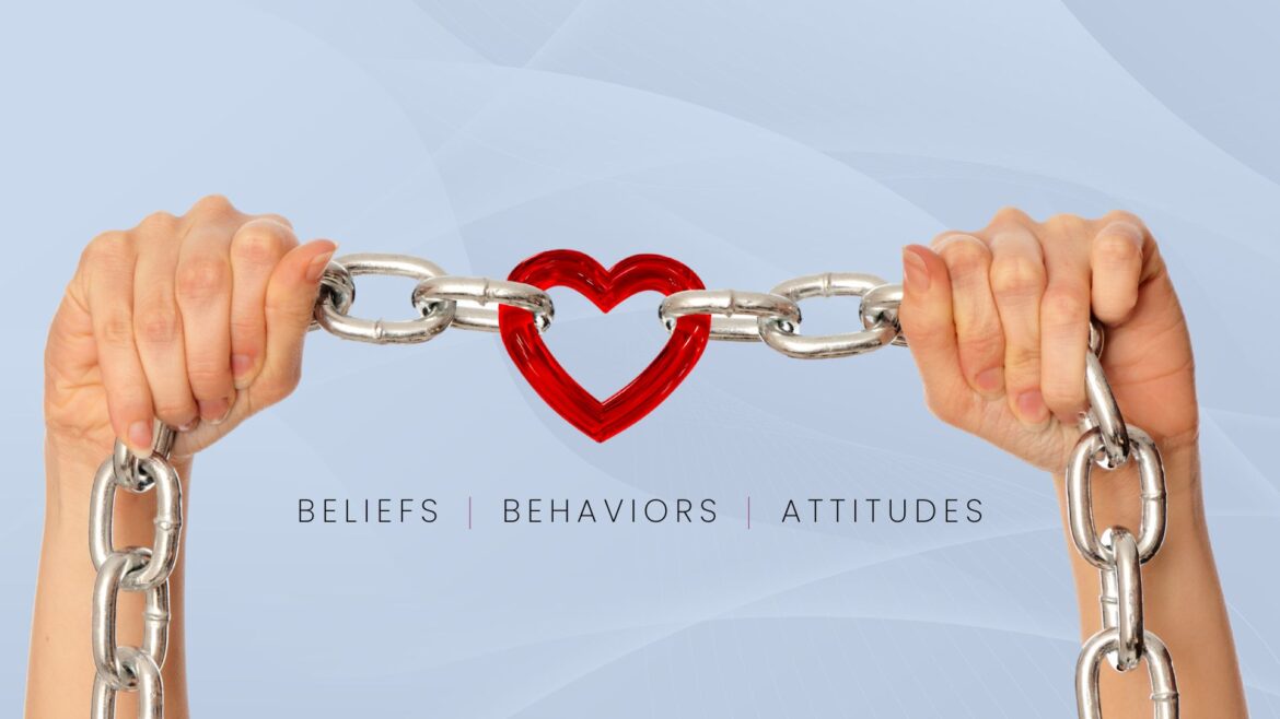 Hands holding a link-style chain, with the center link being a red heart. Text below reads beliefs, behaviors, attitudes.